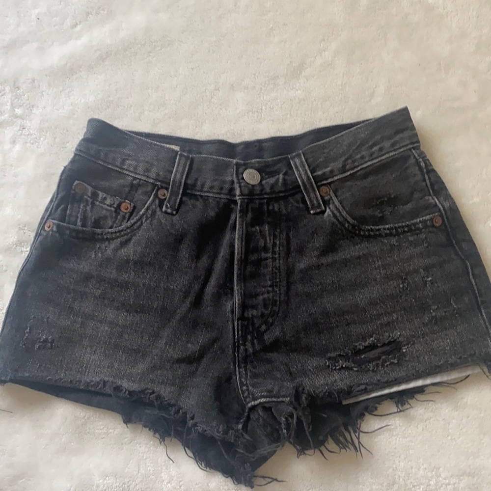 Black distressed Levi shorts